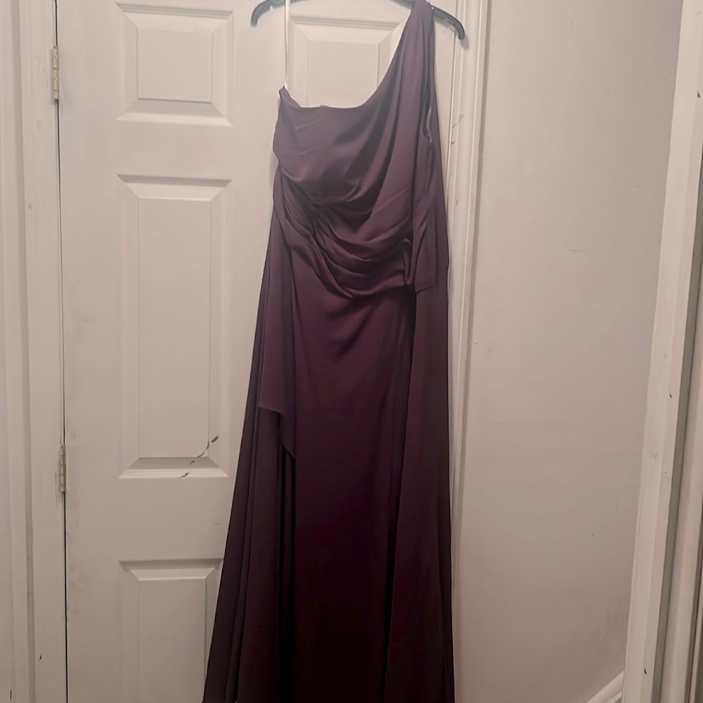 Deep purple, one strap evening gown. Only worn once. Beautiful!